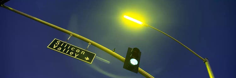 Low angle view of traffic light and a street sign, Silicon Valley, San Francisco, California, USA