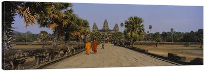 Two monks walking in front of an old temple, Angkor Wat, Siem Reap, Cambodia Canvas Art Print - Asia Art
