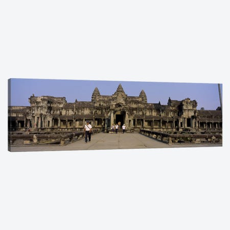 Tourists walking in front of an old temple, Angkor Wat, Siem Reap, Cambodia Canvas Print #PIM5885} by Panoramic Images Canvas Art Print