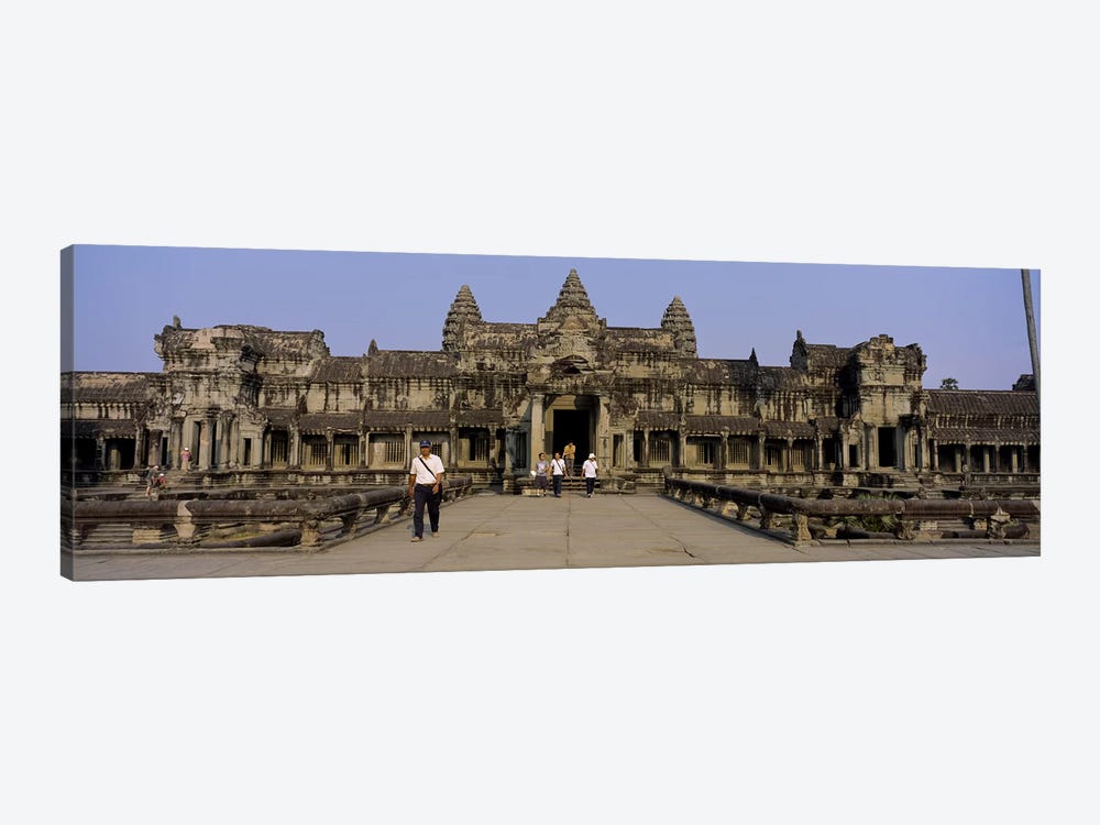 Tourists walking in front of an old temple, Angkor Wat, Siem Reap, Cambodia by Panoramic Images 1-piece Canvas Art