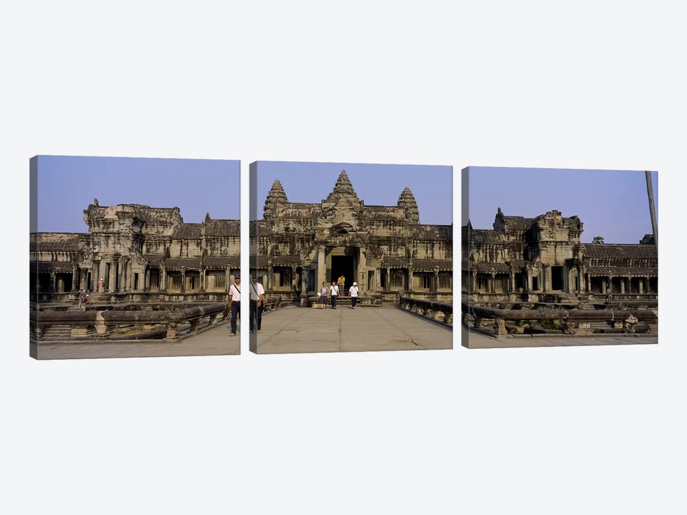 Tourists walking in front of an old temple, Angkor Wat, Siem Reap, Cambodia by Panoramic Images 3-piece Canvas Art