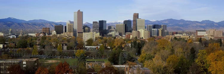 Skyscrapers in a city with mountains in the background, Denver, Colorado, USA