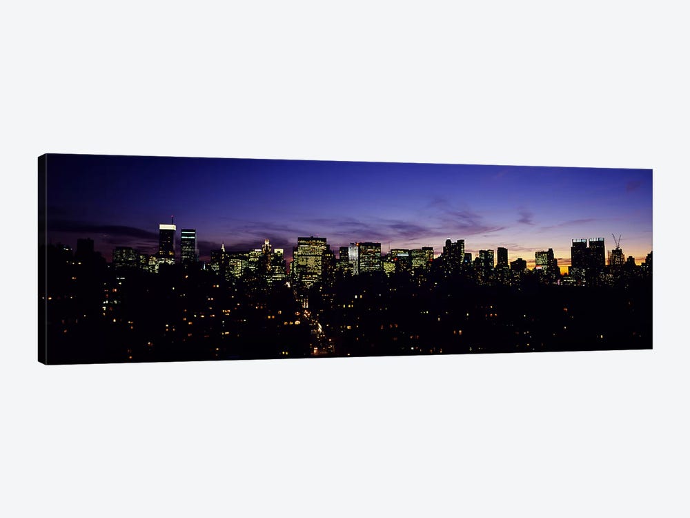 Skyscrapers in a city lit up at night, Manhattan, New York City, New York State, USA by Panoramic Images 1-piece Canvas Artwork