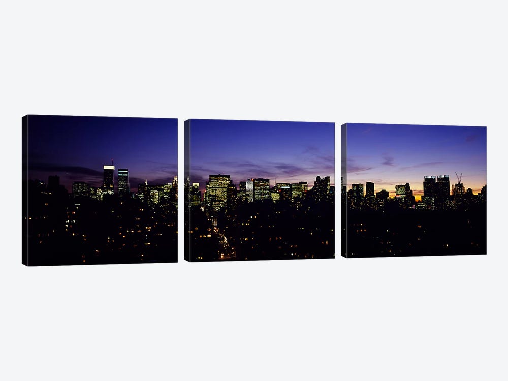 Skyscrapers in a city lit up at night, Manhattan, New York City, New York State, USA by Panoramic Images 3-piece Canvas Wall Art