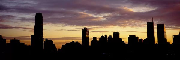 New York City Skylines: Silhouette of skyscrapers at sunset, Manhattan, New York City, New York State, USA by Panoramic Images