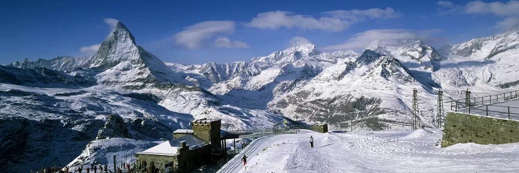 Group of people skiing near a mountain, Matterhorn, Switzerland