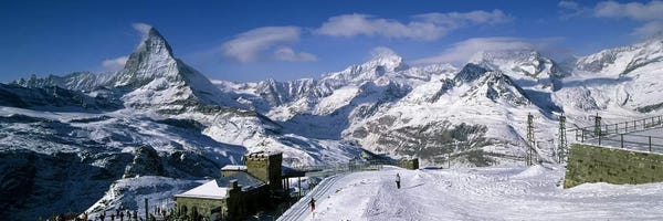 Adventure: Group of people skiing near a mountain, Matterhorn, Switzerland by Panoramic Images