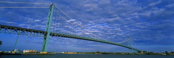 Michigan: Low angle view of a suspension bridge over the river, Ambassador Bridge, Detroit River, Detroit, Michigan, USA by Panoramic Images
