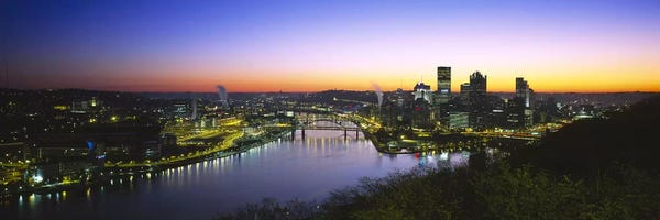 Pennsylvania: Buildings lit up at dawnPittsburgh, Pennsylvania, USA by Panoramic Images