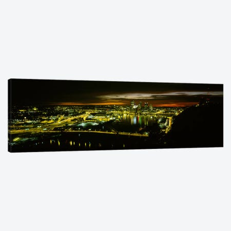 High angle view of buildings lit up at dawnPittsburgh, Pennsylvania, USA Canvas Print #PIM5969} by Panoramic Images Canvas Print