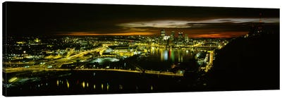 High angle view of buildings lit up at dawnPittsburgh, Pennsylvania, USA Canvas Art Print - Pittsburgh Skylines