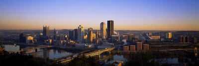 Buildings in a city at dawnPittsburgh, Pennsylvania, USA by Panoramic Images framed canvas print