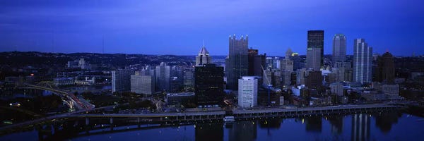 Pittsburgh Skylines: Buildings in a city at duskMonongahela River, Pittsburgh, Pennsylvania, USA by Panoramic Images