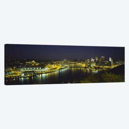 High angle view of buildings lit up at nightThree Rivers Area, Pittsburgh, Pennsylvania, USA Canvas Print #PIM5973} by Panoramic Images Canvas Wall Art