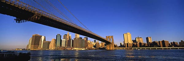 Brooklyn Bridge: Brooklyn Bridge Splitting The Lower Manhattan Skyline View, New York City, New York, USA by Panoramic Images