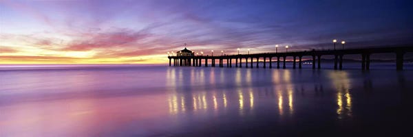 Cloudy Sunsets: Reflection of a pier in water, Manhattan Beach Pier, Manhattan Beach, San Francisco, California, USA by Panoramic Images