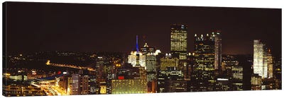 Buildings lit up at night in a cityPittsburgh Pennsylvania, USA Canvas Art Print - Pittsburgh Art