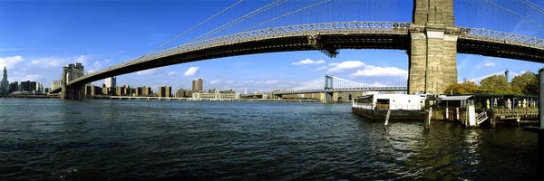 Brooklyn: Suspension bridge across a riverBrooklyn Bridge, East River, Manhattan, New York City, New York State, USA by Panoramic Images