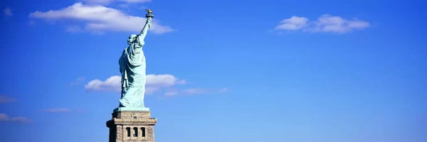 Statue Of Liberty: Low angle view of a statueStatue of Liberty, Liberty State Park, Liberty Island, New York City, New York State, USA by Panoramic Images
