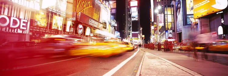 Blurred Motion View Of Nighttime Traffice, Times Square, Midtown, New York City, New York, USA