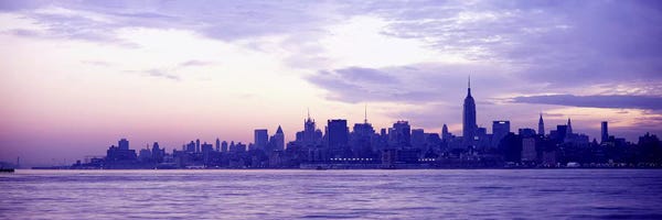 New York City Skylines: Skyscrapers at the waterfront, at sunriseManhattan, New York City, New York State, USA by Panoramic Images