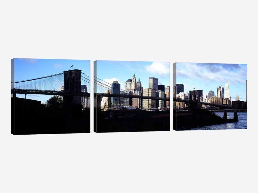 Skyscrapers at the waterfront, Brooklyn Bridge, East River, Manhattan, New York City, New York State, USA by Panoramic Images 3-piece Canvas Print