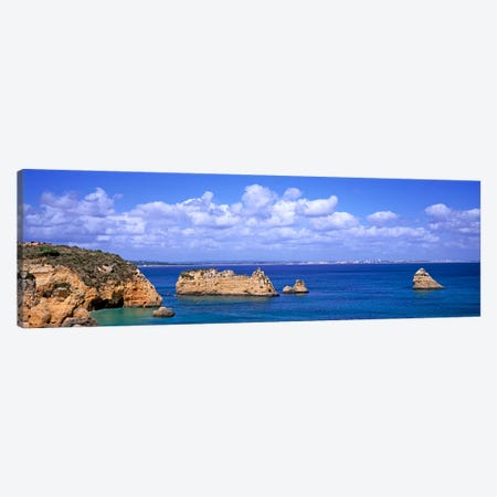 Cloudy Seascape With Limestone Outcrops, Dona Ana Beach, Lagos, Algarve Region, Portugal Canvas Print #PIM609} by Panoramic Images Canvas Artwork