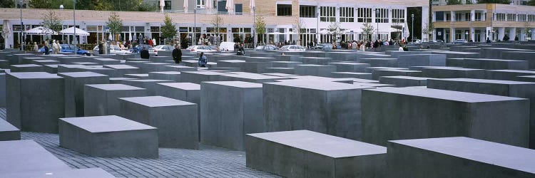 Group of people walking near memorials, Memorial To The Murdered Jews of Europe, Berlin, Germany