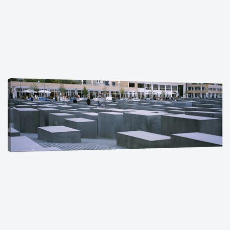 Group of people walking near memorials, Memorial To The Murdered Jews of Europe, Berlin, Germany Canvas Print #PIM6115} by Panoramic Images Art Print