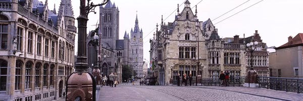 Ghent: Tourists walking in front of a church, St. Nicolas Church, Ghent, Belgium by Panoramic Images