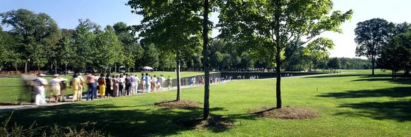 Tourists at a Memorial Vietnam Veterans Memorial, Washington DC, USA
