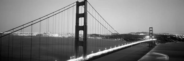 Golden Gate Bridge: High angle view of a bridge lit up at night, Golden Gate Bridge, San Francisco, California, USA by Panoramic Images