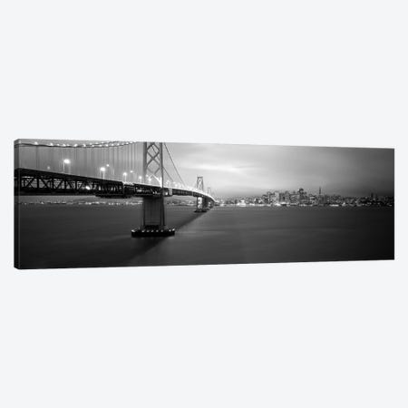 Low angle view of a suspension bridge lit up at nightBay Bridge, San Francisco, California, USA Canvas Print #PIM6281} by Panoramic Images Canvas Wall Art