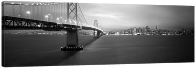 Low angle view of a suspension bridge lit up at nightBay Bridge, San Francisco, California, USA Canvas Art Print - San Francisco Skylines
