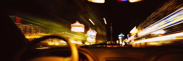Las Vegas: Car on a road at night, Las Vegas, Nevada, USA by Panoramic Images