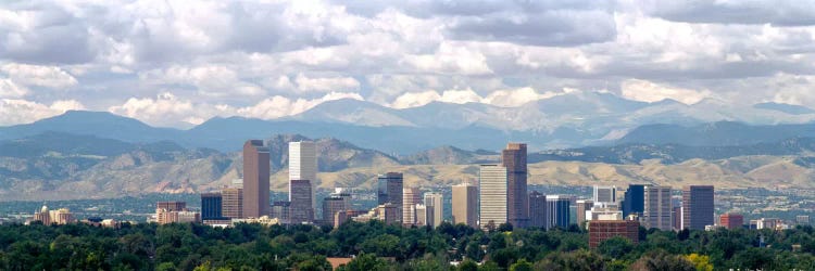 Clouds over skyline and mountains, Denver, Colorado, USA