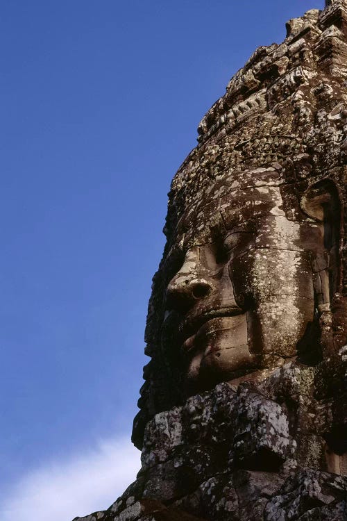 Low angle view of a face carving, Angkor Wat, Cambodia