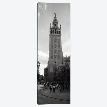 Group of people walking near a church, La Giralda, Seville Cathedral, Seville, Seville Province, Andalusia, Spain Canvas Print #PIM6401} by Panoramic Images Canvas Art