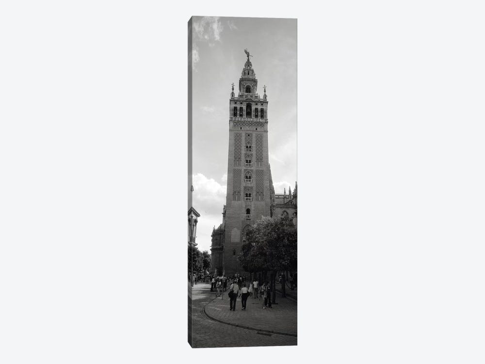 Group of people walking near a church, La Giralda, Seville Cathedral, Seville, Seville Province, Andalusia, Spain by Panoramic Images 1-piece Canvas Wall Art