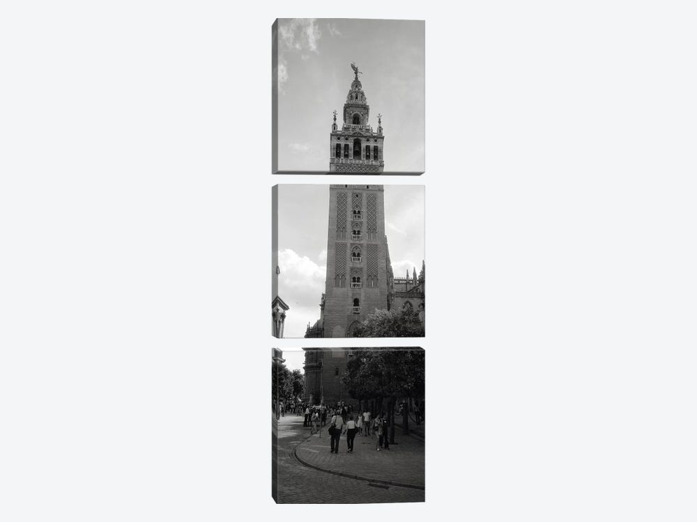 Group of people walking near a church, La Giralda, Seville Cathedral, Seville, Seville Province, Andalusia, Spain by Panoramic Images 3-piece Canvas Art
