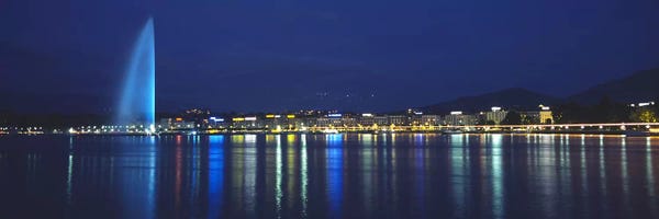 Geneva: Jet d'Eau & Illuminated Buildings Along Quai Gustave-Ador, Geneva, Switzerland by Panoramic Images