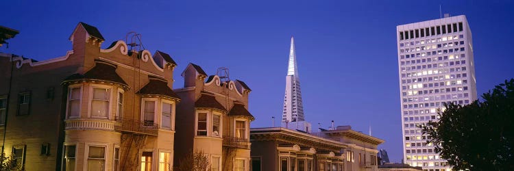 Buildings lit up at dusk, Transamerica Pyramid, San Francisco, California, USA