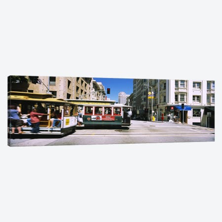 Two cable cars on a road, Downtown, San Francisco, California, USA Canvas Print #PIM6435} by Panoramic Images Canvas Artwork
