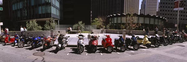 Scooters: Scooters and motorcycles parked on a street, San Francisco, California, USA by Panoramic Images
