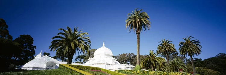 Low angle view of a building in a formal garden, Conservatory of Flowers, Golden Gate Park, San Francisco, California, USA