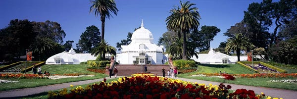 Domes: Tourists in a formal garden, Conservatory of Flowers, Golden Gate Park, San Francisco, California, USA by Panoramic Images