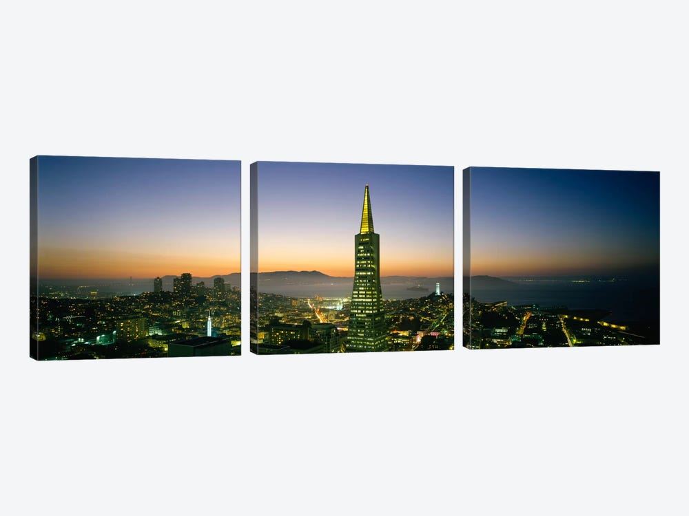 Buildings lit up at duskTransamerica Pyramid, San Francisco, California, USA by Panoramic Images 3-piece Art Print