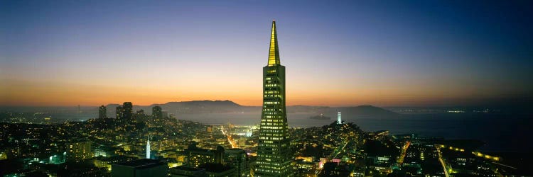 Buildings lit up at duskTransamerica Pyramid, San Francisco, California, USA