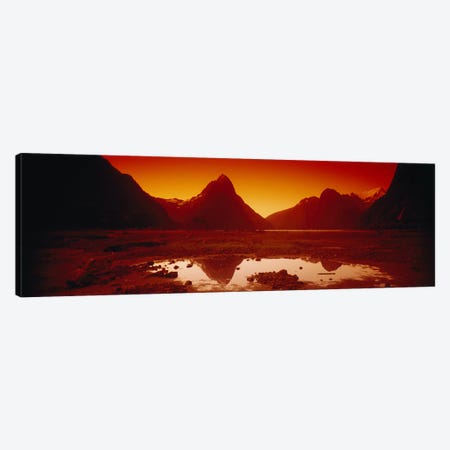 Orangish-Red Sunrise Over Mitre Peak And Milford Sound, South Island, New Zealand Canvas Print #PIM6527} by Panoramic Images Canvas Artwork