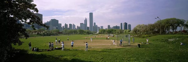 Chicago Skylines: Group of people playing baseball in a park, Grant Park, Chicago, Cook County, Illinois, USA by Panoramic Images